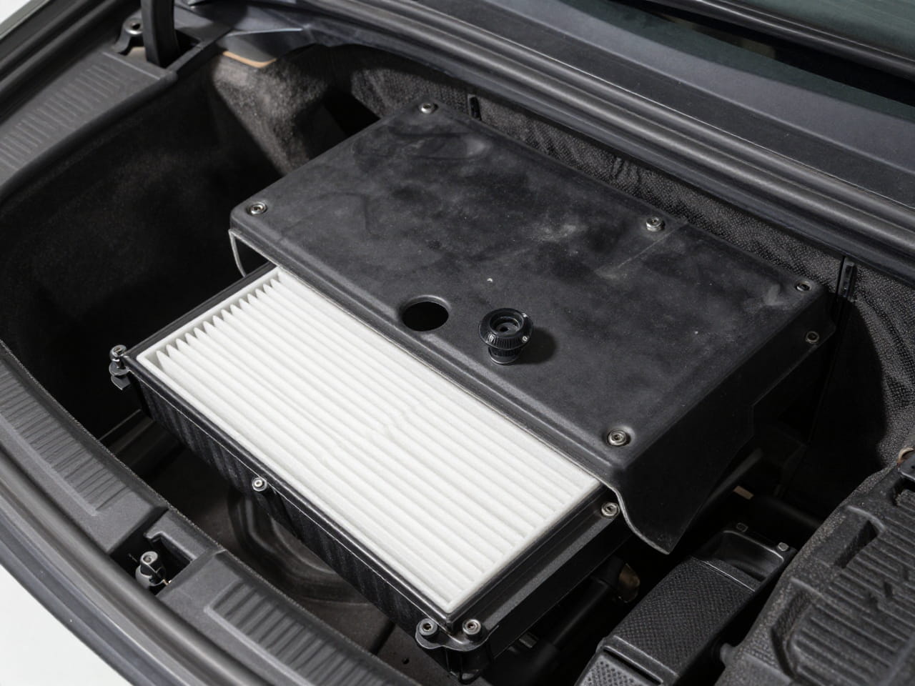 Step-by-step guide showing how to access the housing for a cabin air filter replacement.